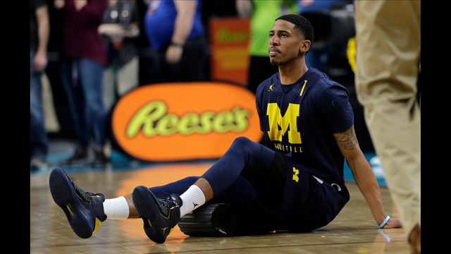 Final Four puts transfers, and need for reform, in display | KIRO-TV Michigan guard Charles Matthews stretches on the court during a practice session for the Final Four NCAA college basketball tournament, Friday, March 30, ...