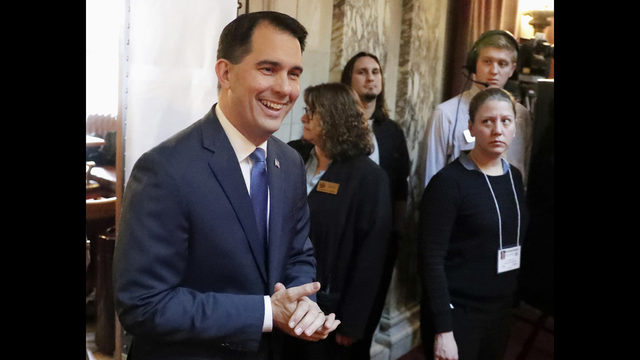 Wisconsin's Walker tries to alter conversation amid bad news