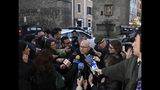 Bishop Fernando Ramos, Secretary General Episcopal Conference of Chile, receives media attention near the Vatican, in Rome Monday, Jan. 14, 2019. A delegation of Chilean bishops has met with Pope Francis a year after he threw his papacy into turmoil by defending a Chilean bishop accused of covering for a notorious sexual predator. (AP Photo/Alessandra Tarantino)