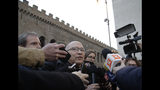 Bishop Fernando Ramos, Secretary General Episcopal Conference of Chile, receives media attention near the Vatican, in Rome Monday, Jan. 14, 2019. A delegation of Chilean bishops has met with Pope Francis a year after he threw his papacy into turmoil by defending a Chilean bishop accused of covering for a notorious sexual predator. (AP Photo/Alessandra Tarantino)