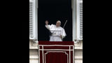Pope Francis salutes the crowd as he recites the Angelus noon prayer from the window of his studio overlooking St.Peter's Square, at the Vatican, Sunday, Jan. 13, 2019. (AP Photo/Alessandra Tarantino)