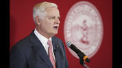 University of Oklahoma President, James Gallogly, addresses the media at the school in Norman, Okla., Monday, Jan. 21, 2019, to talk about a video that showed an OU student wearing black face. Two OU students have voluntarily withdrawn from the school after one appeared in the video posted on social media wearing black face paint and using a racial epithet, Gallogly said Monday. (Doug Hoke/The Oklahoman via AP)
